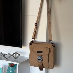 Pajar mustard brown Messenger Bag. NWOT. 10” X 10” and can expand to 4” wide.